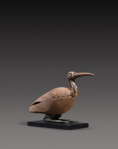 View full screen - View 1 of Lot 42. An Egyptian Composite Wood and Bronze Figure of an Ibis, Late Period, 716-30 B.C., in whole or in part.
