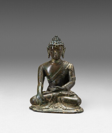 View full screen - View 1 of Lot 112. A copper-alloy figure of a seated Buddha Nepal, ca. 15th century | 尼泊爾 約十五世紀 銅合金佛坐像.