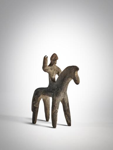 View full screen - View 1 of Lot 7. Greek Terracotta Figure of a Warrior on Horseback, Boeotia, circa Late 7th - Early 6th Century BC.