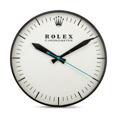 View full screen - View 1 of Lot 197. THE OHIO ADVERTISING DISPLAY CO. FOR ROLEX | REFERENCE G-062, A LARGE BLACKENED METAL WALL CLOCK, CIRCA 1965.