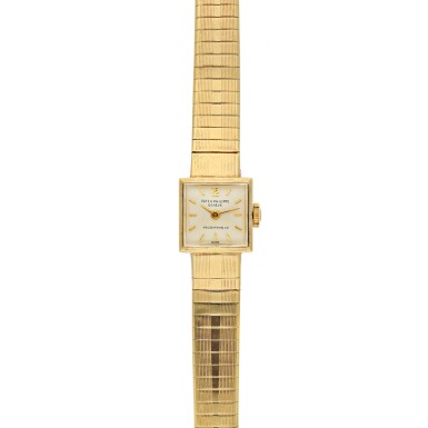 View full screen - View 1 of Lot 35. PATEK PHILIPPE | REFERENCE 3086/67 RETAILED BY HAUSMANN & CO.: A YELLOW GOLD SQUARE FORM BRACELET WATCH, CIRCA 1970.