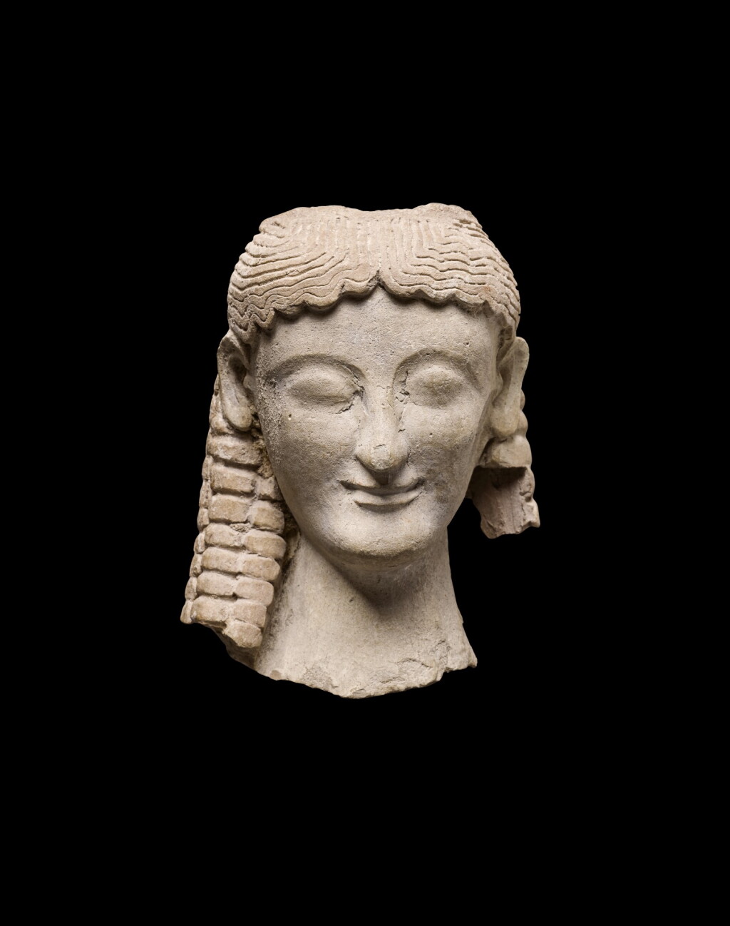 View full screen - View 1 of Lot 150. A Greek Terracotta Head of a Goddess, Magna Graecia circa late 6th/early 5th Century B.C.