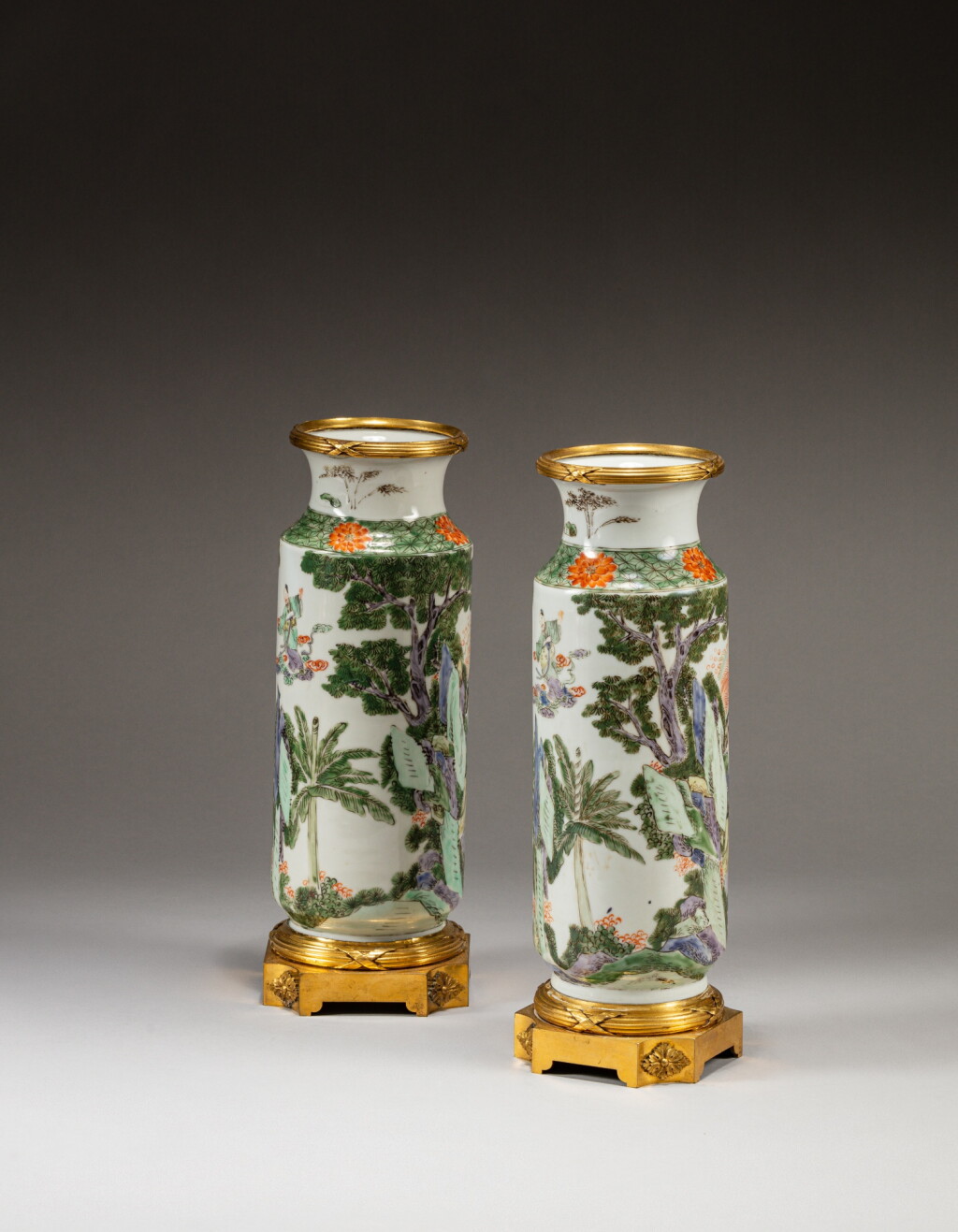 View full screen - View 1 of Lot 22. A pair of famille-verte 'figural' rouleau vases, Qing dynasty, 19th century | 清十九世紀 五彩人物故事紋棒槌瓶一對.