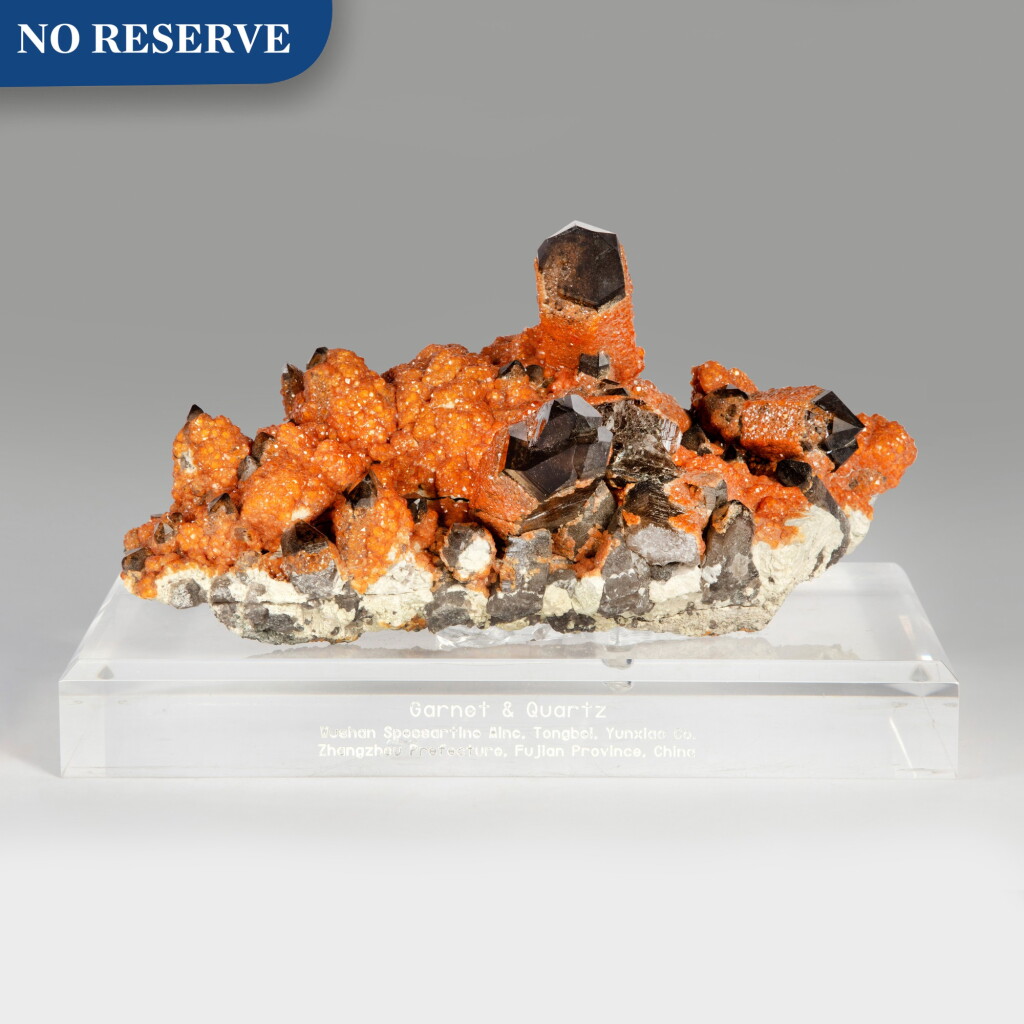 View full screen - View 1 of Lot 212. A Fine Spessartine Garnet on Smoky Quartz.
