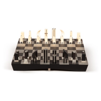View full screen - View 1 of Lot 35. Rainer Facklam (born in 1960) , A wood, ebony and brushed inox chess set, 21th century | Rainer Facklam (né en 1960) Jeu d'échecs en bois, ébène et inox brossé, XXIe siècle.