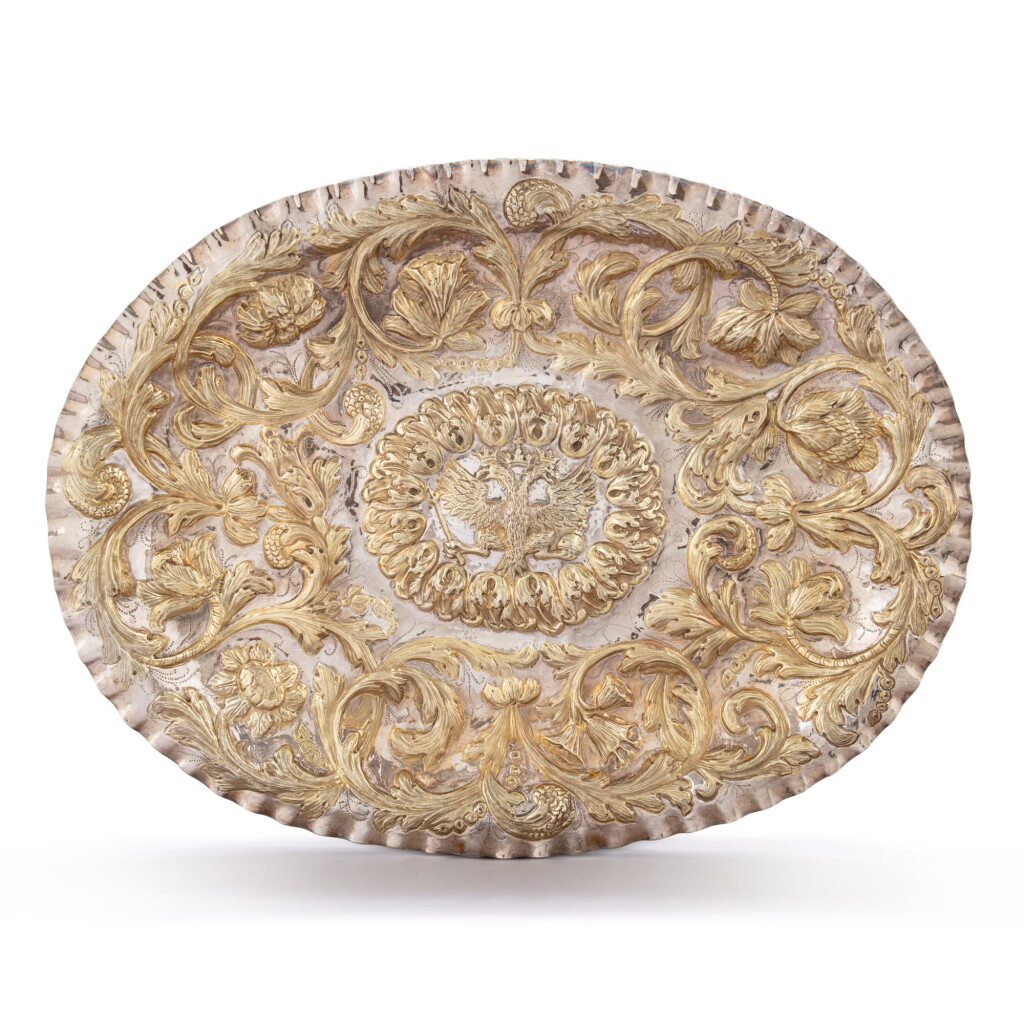 View full screen - View 1 of Lot 275. A large parcel-gilt silver salver, Ivanov, Moscow, 1716.