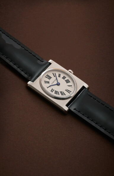 View full screen - View 1 of Lot 27. Reference 9136 | Retailed by Cartier New York: A white gold rectangular wristwatch with white gold deployant buckle, Circa 1968 .