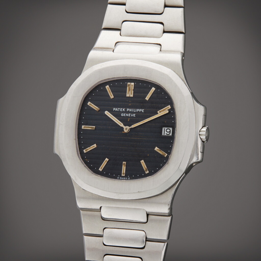View full screen - View 1 of Lot 24. Reference 3700/1 Nautilus | A stainless steel wristwatch with date, bracelet and original cork box, Made in 1979.