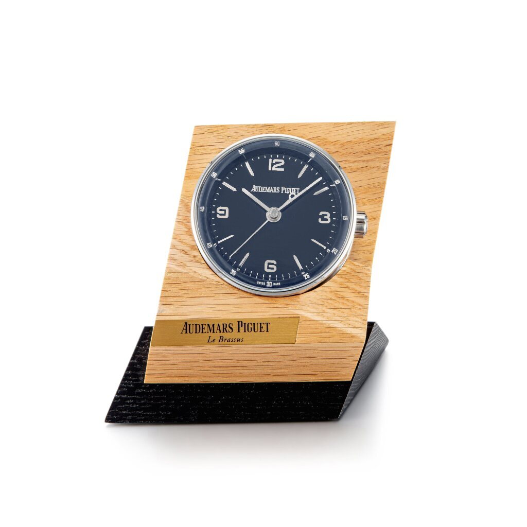 View full screen - View 1 of Lot 8845. Code 11.59 | A stainless steel alarm desk clock with wooden stand, Circa 2019 | 愛彼 | Code 11.59 | 精鋼鬧鐘,備木製展示座,約2019年製.