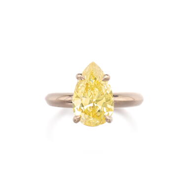 View full screen - View 1 of Lot 511. Fancy Intense Yellow diamond ring.