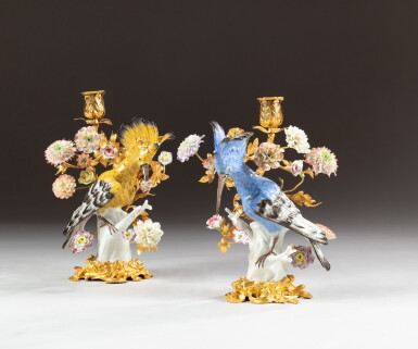 View full screen - View 1 of Lot 43. A pair of Louis XV style gilt bronze candlesticks, with porcelain possibly Samson or later and soft paste flowers | Paire de flambeaux en bronze doré, porcelaine à la manière de Meissen, probablement Samson ou postérieure et fleur en pâte tendre, style Louis XV.