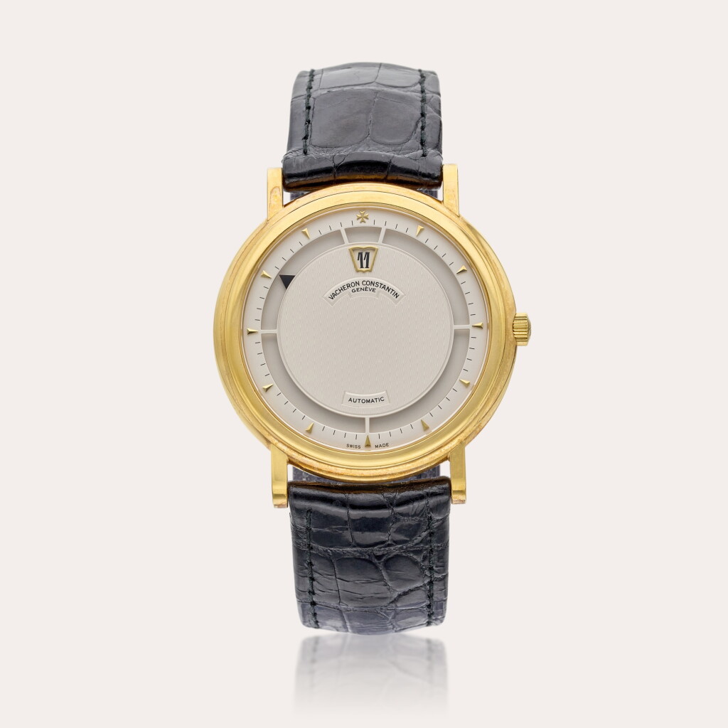 View full screen - View 1 of Lot 471. Reference 43040/000J-19 Jump Hour | A yellow gold automatic jumping hour wristwatch, Circa 1995.
