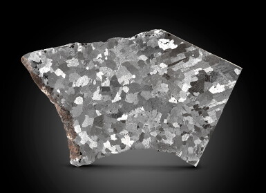 View full screen - View 1 of Lot 116. Willamette Meteorite — Partial Slice From The Crown Of The Crown Jewel Of Meteorites.