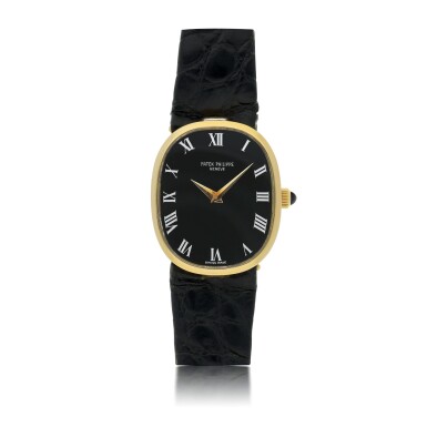 View full screen - View 1 of Lot 125. PATEK PHILIPPE | REF 3748/900 ELLIPSE, A YELLOW GOLD OVAL WRISTWATCH CIRCA 1985.