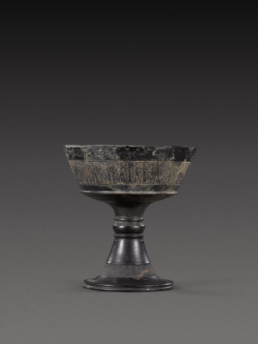 View full screen - View 1 of Lot 104. An Etruscan Bucchero Chalice, circa mid-6th Century B.C..