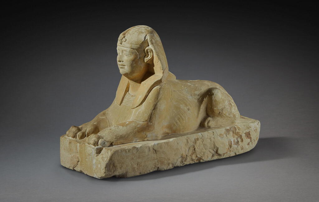 View full screen - View 1 of Lot 209. An Egyptian Limestone Sphinx of a Ptolemaic King, Ptolemaic Period, probably reign of Ptolemy II, 285-246 B.C..