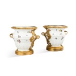 A pair of Louis XV gilt-bronze mounted Meissen porcelain cache-pots, circa 1740