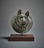 A Roman Bronze Roundel with a Relief Bust of a Molossian Hound, circa 1st/2nd century A.D.