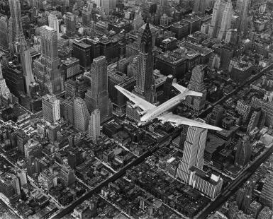 View full screen - View 1 of Lot 86. 'A DC-4 Flying over New York City'.