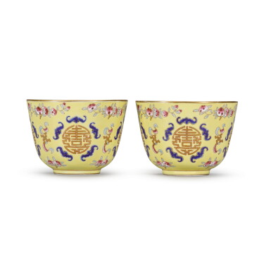 View full screen - View 1 of Lot 230. A pair of famille-rose yellow-ground cups Marks and period of Tongzhi | 清同治 黃地粉彩五福捧壽紋盃一對 《大清同治年製》款.