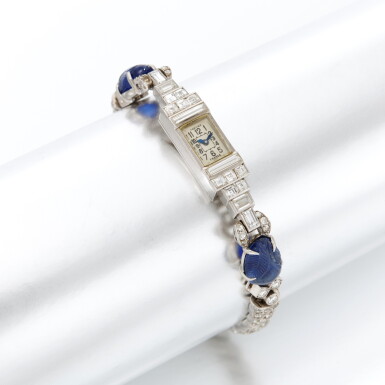View full screen - View 1 of Lot 36. Platinum, diamond and sapphire bracelet watch , Cartier (Orologio bracciale in diamanti e zaffiri, Cartier).