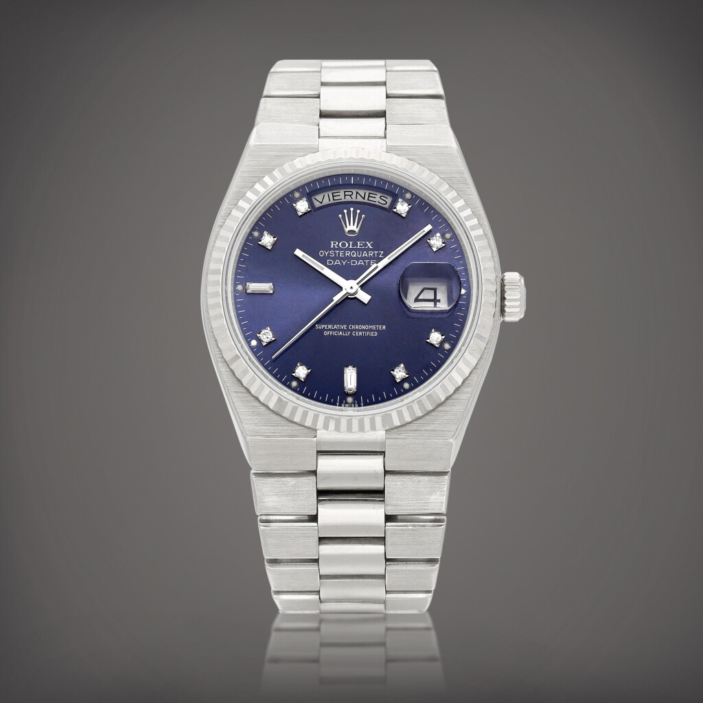 View full screen - View 1 of Lot 2231. Oysterquartz Day-Date, Reference 19019 | A white gold and diamond-set bracelet watch with Spanish day and date, Circa 1985 | 勞力士 | Oysterquartz Day-Date 型號19019 | 白金鑲鑽石鏈帶腕錶,備日期及西班牙文星期顯示,約1985年製.