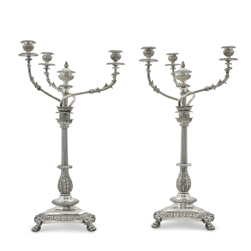 View full screen - View 1 of Lot 177. A pair of Sheffield plate four-light candelabra, early 19th century.