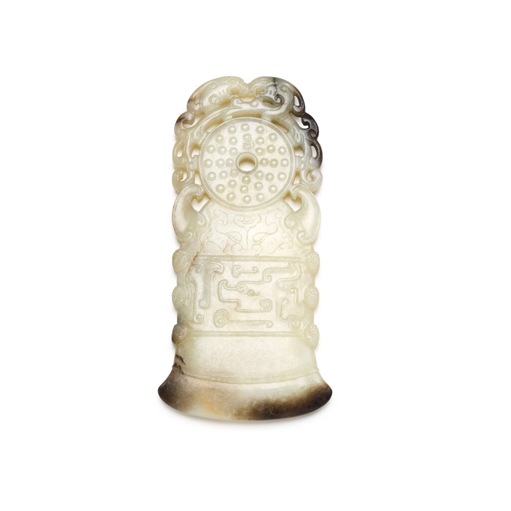 View full screen - View 1 of Lot 241. A MOTTLED GREY AND WHITE JADE ARCHAISTIC PLAQUE, QING DYNASTY, 18TH CENTURY | 清十八世紀 灰白玉鏤雕仿古螭龍紋斧珮.