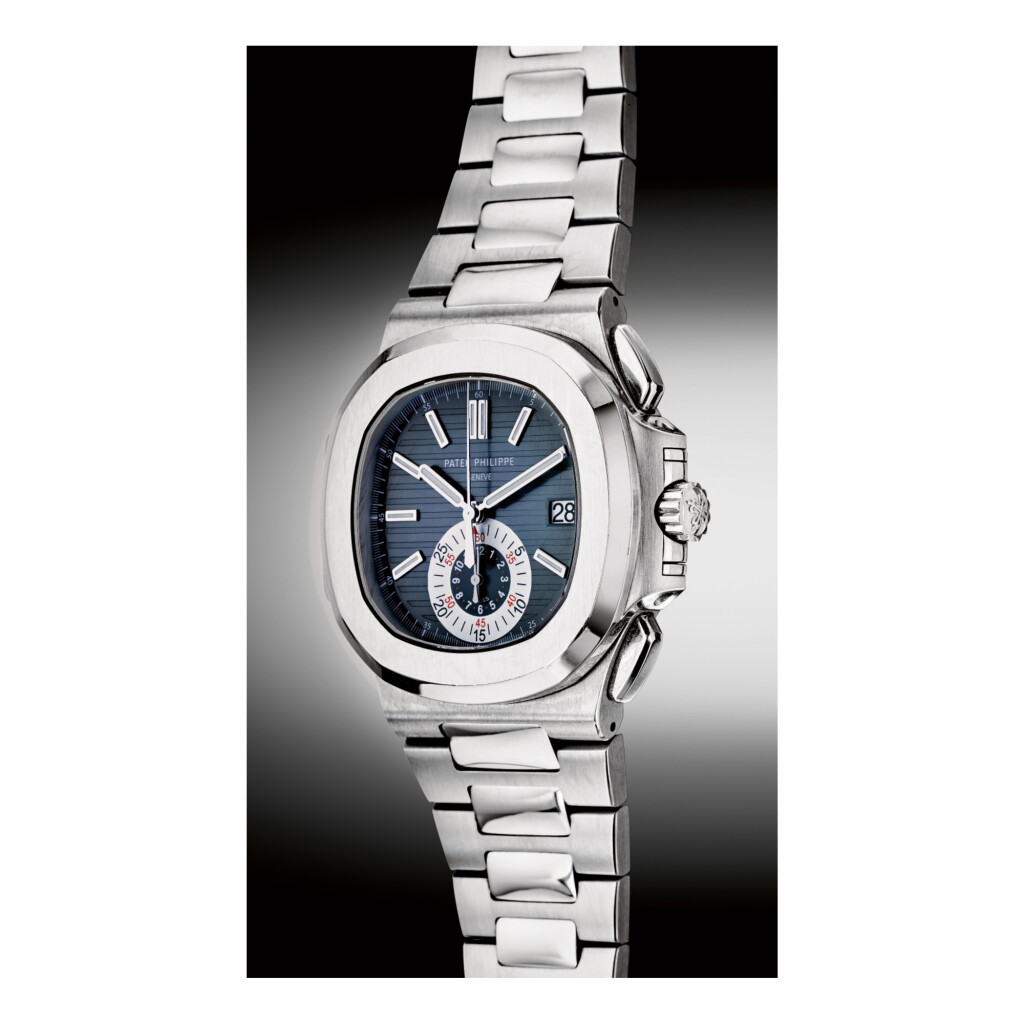 View full screen - View 1 of Lot 958. PATEK PHILIPPE | REF 5980/1A NAUTILUS, A STAINLESS STEEL FLYBACK CHRONOGRAPH WRISTWATCH WITH DATE AND BRACELET CIRCA 2009 | 百達翡麗 | 5980/1A型號「NAUTILUS」精鋼飛返計時鍊帶腕錶備日期顯示,年份約2009.