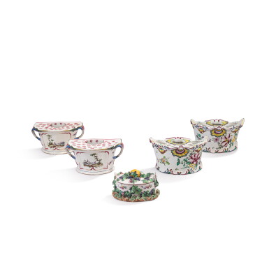 View full screen - View 1 of Lot 695. A pair of French faience bouquetières, a pair of Continental faience bouquetières and a French faience butter box and cover, second half 18th century and later.