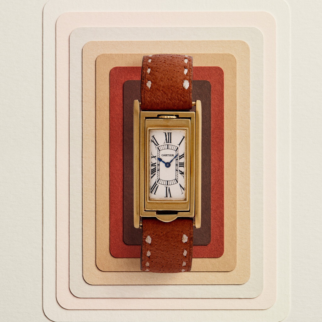 View full screen - View 1 of Lot 142. Retailed by Cartier New York: Tank Basculante | A rare and early yellow gold reversible wristwatch with gold deployant clasp | Circa 1933.