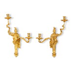 A pair of Régence style gilt-bronze two-light "Mars and Minerva" wall-lights, 19th century | Paire d'appliques "Mars et Minerve" en bronze doré à deux lumières de style Régence, XIXe siècle