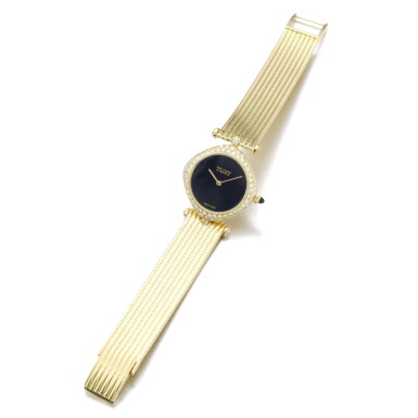 View full screen - View 1 of Lot 448. GERALD GENTA & VAN CLEEF & ARPELS | GOLD, ONYX AND DIAMOND WRISTWATCH.
