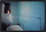 Self portrait in blue bathroom