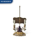 A Louis XV Two-Light Gilt Bronze Reading Candelabra with a Chinese Porcelain Figure of a Magot and White French Porcelain Flowers, Circa 1830