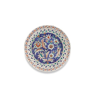 View full screen - View 1 of Lot 217. An Iznik polychrome pottery dish, Turkey, circa 1585.