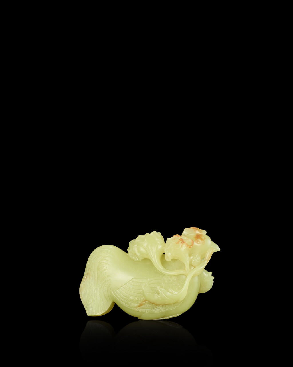View full screen - View 1 of Lot 3920. A yellow jade figure of a rooster, Qing dynasty | 清 黃玉銜花瑞雞.