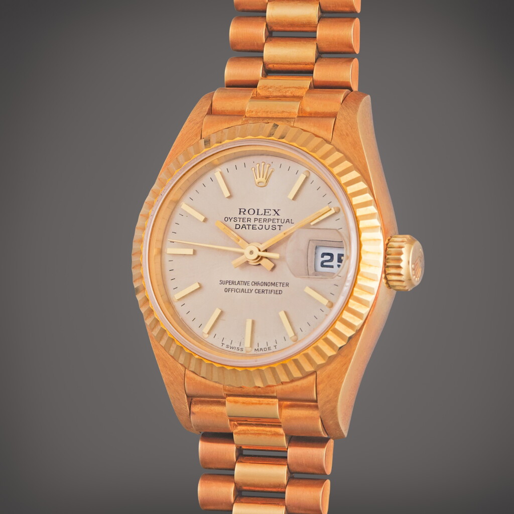 View full screen - View 1 of Lot 310. Reference 69178 Datejust | A yellow gold automatic wristwatch with date and bracelet, Circa 1995.