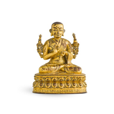 View full screen - View 1 of Lot 94. A gilt-bronze figure of a lama, Qing dynasty, 18th century | 清十八世紀 鎏金銅喇嘛坐像.