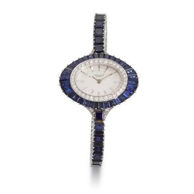 View full screen - View 1 of Lot 319. PATEK PHILIPPE | REFERENCE 4020/1, WHITE GOLD, DIAMOND AND SAPPHIRE-SET BRACELET WATCH, MADE IN 1973.