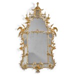 A George III carved parcel-gilt and painted pier mirror, circa 1760