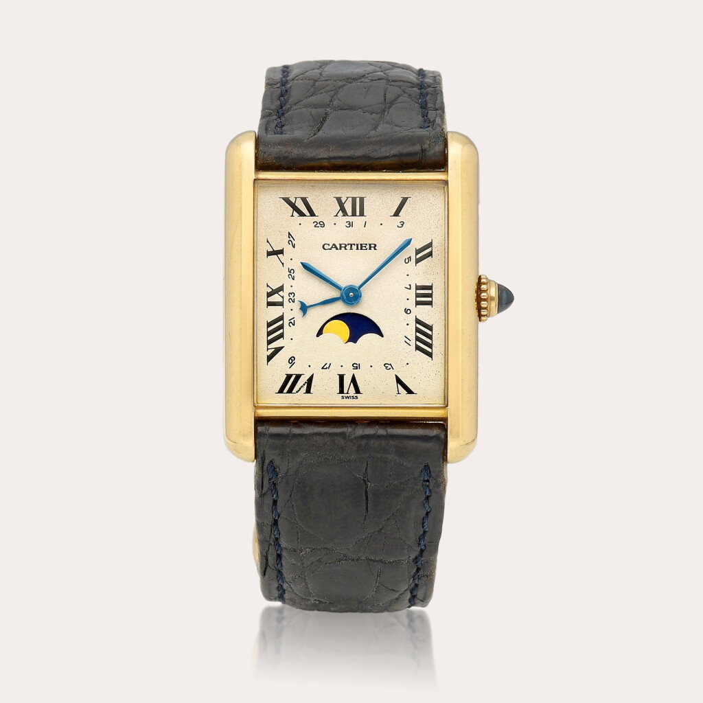 View full screen - View 1 of Lot 2177. Tank, Reference 1900 A yellow gold wristwatch with date and moon phases, Circa 1990 | 卡地亞 | TANK 型號1900 | 黃金腕錶,備日期及月相顯示,約1990年製.