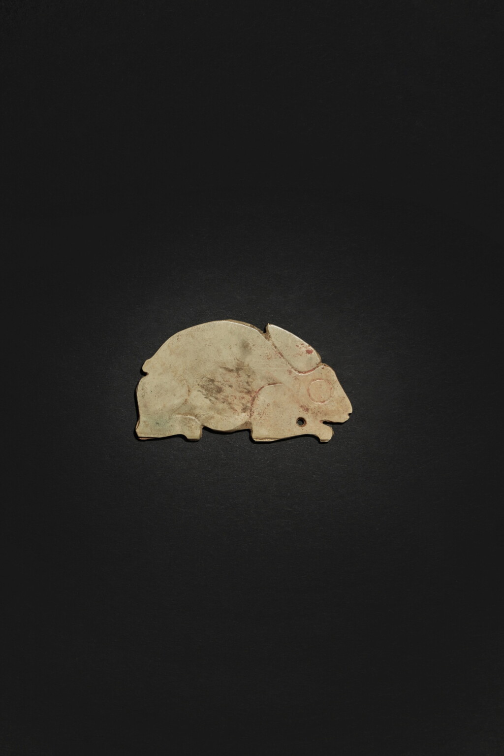 View full screen - View 1 of Lot 38. An archaic jade figure of a rabbit, Western Zhou dynasty.
