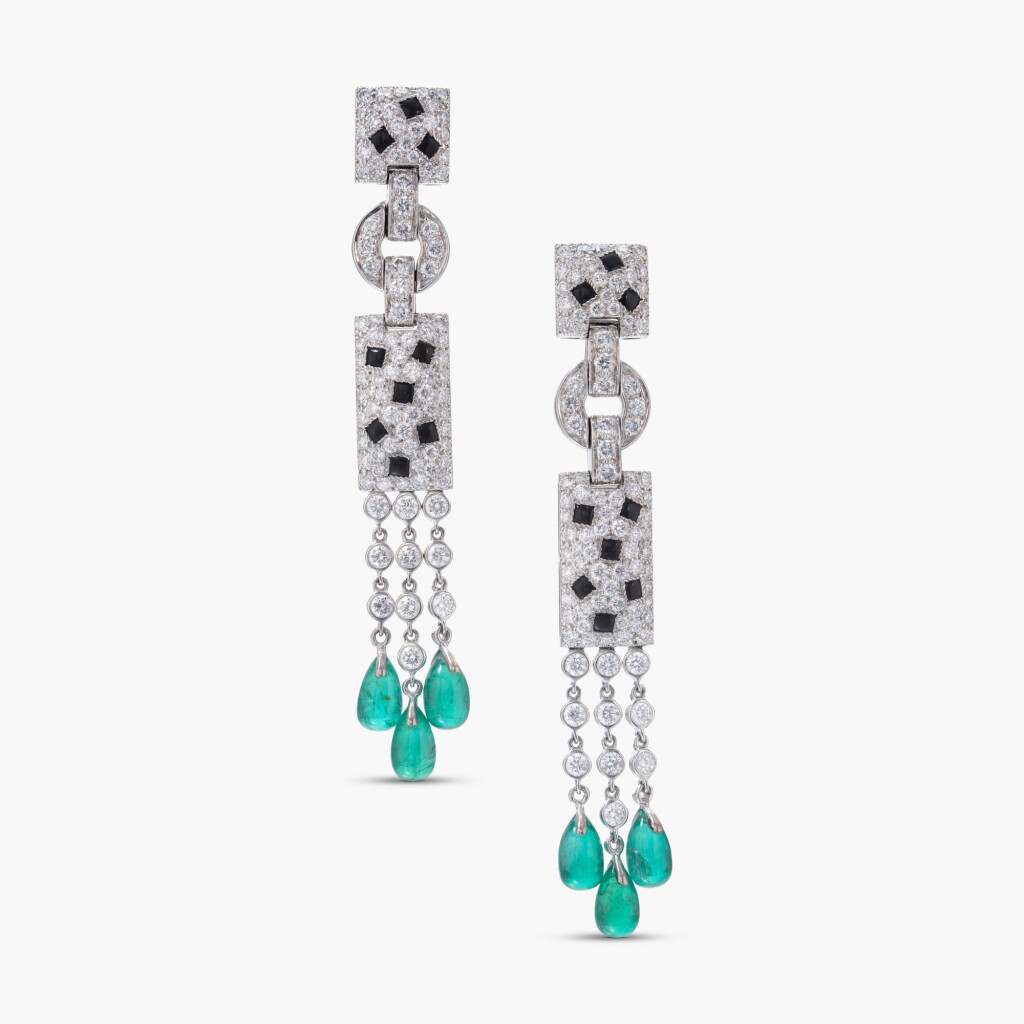 View full screen - View 1 of Lot 713. Pair of Emerald, Onyx and Diamond 'Panthère' Pendent Earclips.