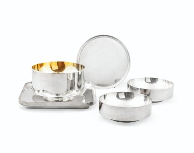 View full screen - View 1 of Lot 566. A bowl Grande coupe ronde with Lid, Two bowls Petites coupes Rondes and a Plat carré dish, Reflet for Christofle Haute Orfèvrerie, 2001.