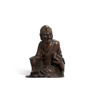 View full screen - View 1 of Lot 9564. A bronze 'Luohan and tiger' group, Qing dynasty, 18th century | 清十八世紀 銅伏虎羅漢像.