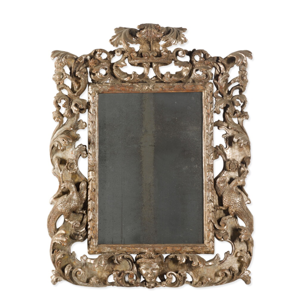 View full screen - View 1 of Lot 55. A Continental Baroque carved and silvered-wood mirror, possibly German, mid-17th century.
