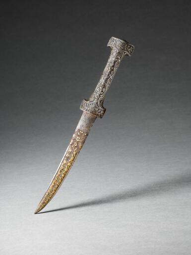 View full screen - View 1 of Lot 663. An Ottoman dagger with gold inlaid blade, Turkey, 16th century, with silver hilt, 18th century.