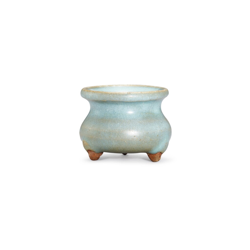 View full screen - View 1 of Lot 370. A miniature Junyao blue-glazed tripod incense burner, Song - Yuan dynasty 宋至元 鈞窰天藍釉三足小爐.