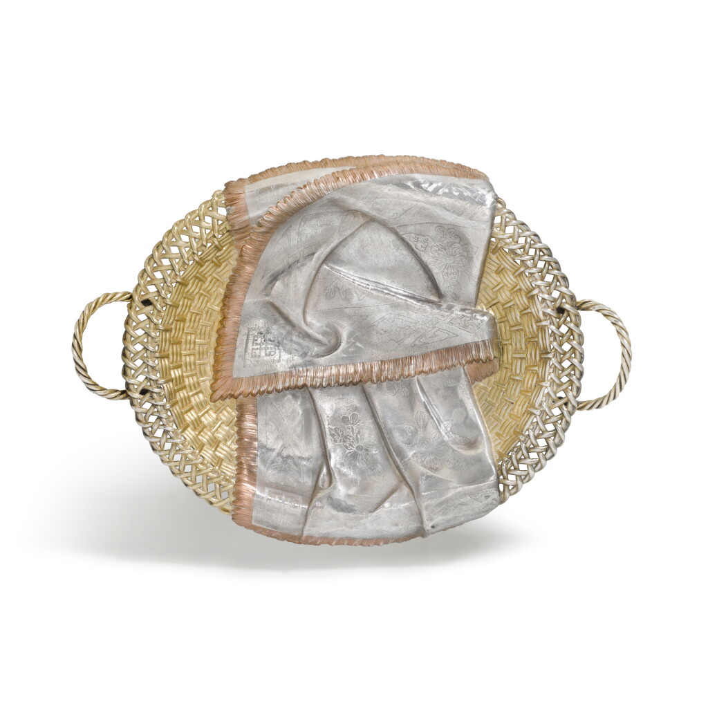 View full screen - View 1 of Lot 79. A parcel-gilt silver trompe l'oeil bread basket, Khlebnikov, Moscow, 1882.